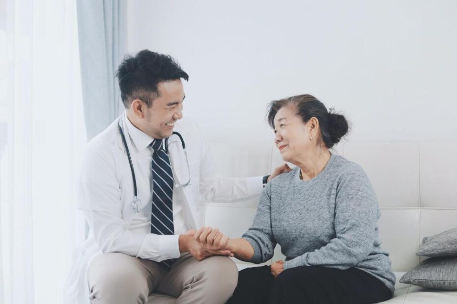 A doctor is comforting a patient